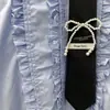 Vestido Camisa Largo Holgado de Manga Larga Estilo Francés con Lazo, Borde Fruncido, Diseño de Nicho, Nuevo Estilo Primavera 2026