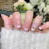 Uñas Postizas Pre-Hechas Hechas a Mano Rosa Nude Perla Moño 3D Terapia de Luz Super Iluminadoras para Uñas Cortas