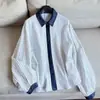 2026 Nuevo Estilo Camisa de Mezclilla Corta Color Block Rayada para Viajes Camisa Holgada Venta al por Mayor N5CT26036