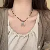 2025 Novo Colar Boêmio de Flor e Pérola para Mulheres Novo Estilo Chinês Estilo Nacional Cordão de Couro Estilo Étnico Colar de Contas