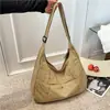 Bolsa com sensação preguiçosa e relaxada para mulheres 2026 nova tendência bolsa tote de grande capacidade bolsa de ombro única para aula trajeto bolsa transversal