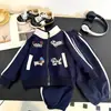 Trajes para Niños Primavera y Otoño Nuevo Deportivo Moda Coreana Dibujos Animados para Niños y Niñas, Mediano y Grande Cremallera de Niños Conjunto de Dos Piezas Ropa de Niños