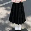 Conjunto de dos piezas para niña: una sudadera con cuello de muñeca y una falda midi de moda con lazo, perfecta para principios de otoño, adecuada para la escuela
