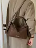 Nuevo bolso de hombro para mujer de otoño e invierno, estilo coreano, moda de alta gama, bolso versátil vintage para el día a día, bolso de mano mate, bolso cruzado para mujer