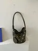 Bolso de mano único de lunares para mujer, bolso tote pequeño exquisito y súper popular, nuevo bolso de hombro versátil de moda 2026, bolso tipo cubo personalizado