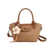 Bolso cuadrado pequeño de mano moderno y sencillo, nuevo modelo de verano 2026, bolso de hombro casual sencillo, bolso cruzado de nicho estilo coreano para mujer