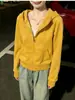 Jaqueta Moletom Amarelo Gengibre com Ombro Caído Feminino Top Cropped com Capuz Outono Inicial 2026 Novo Estilo Coreano Roupa de Outono