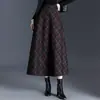 Elegante Falda Versátil de Cuadros Línea A para Mujer 2026 Otoño/Invierno Nueva Falda Larga Adelgazante de Cintura Alta Falda de Dobladillo Ancho para Viajar