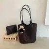 Bolsa de mão com estampa de leopardo para mulheres, nova coleção de outono 2026, bolsa de ombro grande capacidade para o dia a dia, casual e estilosa, bolsa tote de ombro requintada