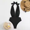 Traje de baño de una pieza de estilo nuevo europeo y americano transfronterizo para mujer, ajustado, sexy, bikini de chica hot, escote en V profundo, sin espalda, traje de baño de alta gama