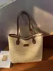 Bolso de paja de gran capacidad para mujer, estilo transfronterizo, para ir al trabajo, nuevo de verano 2026, popular, bolso de mano de un solo hombro, bolso de axila