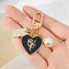 Llavero Lindo Chica Corazón Rosa Amor Placa Aleación Cabeza de Llavero para Coche Colgante de Auriculares Accesorios para Colgar en Bolsos