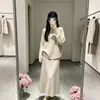 Conjunto de dos piezas de punto relajado estilo coreano: suéter suave y holgado + falda de tiro alto, atuendo elegante para ir al trabajo en otoño e invierno