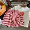 Traje Infantil de Manga Corta, Nuevo Estilo de Verano para Niños Pequeños y Medianos, Tops Elegantes para Niños y Niñas, Conjunto de Dos Piezas con Shorts Rayados, Moderno