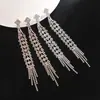 Pendientes largos de borla con pedrería nuevos de fábrica para mujer, delgados, totalmente de diamantes, para boda, escenario, pendientes con temperamento E698