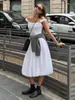 Vestido Jacquard Cruzado Hombros Descubiertos Estilo Europeo y Americano Verano 2026 Nuevo Bordado Hueco Francés Ajustado Vestido Largo Floral