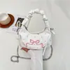 Bolsa de Mão Plissada com Laço Estilo Coreano Nicho Shuai Mi Home para Mulheres 2026 Nova Bolsa Transversal Simples Elegante com Bolinhas
