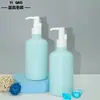 Yigao Embalagens Em Estoque Frasco Redondo de Plástico para Shampoo de 300ml com Bomba, Tipo Frasco para Limpador Facial, Frasco Dosador de Plástico PET