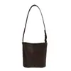 Bolsa Saco com Padrão Trançado para Mulheres Verão 2026 Nova Moda Bolsa de Ombro Simples Estilo Coreano Nicho Cor Sólida Bolsa Transversal