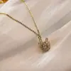 Collar de circonita giratorio con forma de dragón pequeño exquisito elegante dulce sentido de alta gama zodiaco Dragón año de nacimiento cadena clavicular