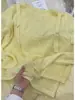 Suéter Tejido Amarillo Estilo Europeo Falso Dos Piezas para Mujer, Nuevo Estilo Primavera 2026, Suave Casual Corte Holgado, Rejuvenecedor, Top de Alta Gama