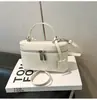 Bolso de Caja Transfronterizo de Diseño de Nicho para Mujer 2026 Nuevo Modelo Bolso de Mano Compacto Exquisito Bolso de Hombro Cruzado de Moda para Viajero