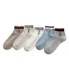 Calcetines Bordados de Cachorro con Gorro Rojo de Dibujos Animados Color-Bloque para Mujer, Calcetines Cortos Finos Sin Costuras de Algodón Puro para Primavera y Verano, Calcetines Populares de Caña Media 2026