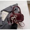 Bolso de Mano de Moda Coreana Nuevo Bolso de Hombro Boston Trendy Verano 2025 Nicho Simple de Alta Gama Bolso Cruzado