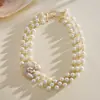 Collar de perlas en capas con cuentas transfronterizo europeo y americano, cadena para la clavícula estilo fiesta vintage, lujo ligero, accesorio versátil de alta gama para mujer