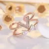 Anillo de lazo de microincrustaciones de circonita de lujo ligero estilo coreano y japonés para mujer, anillo abierto de doble capa chapado en oro de 18 quilates, joyería versátil a la moda