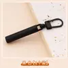 Tirador de metal cremallera desmontable bolsa ropa zapatos agujero pequeño cabeza semi-automática colgante hebilla de alta calidad accesorios