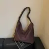 Bolso de mano de moda nuevo para principios de otoño de 2026 con estampado de leopardo, bolso de hombro vintage de nicho, bolsa de mano informal personalizada de gran capacidad