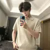 Venta al por mayor de fábrica Calle Retro Tejido de punto trenzado Manga corta Camisa Polo para hombre Marca de moda Holgada Pareja Top Camiseta de alta gama