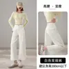 Jeans acampanados de tiro alto nuevos 2026 transfronterizos, pantalones vaqueros lavados con efecto desgastado estilo retro americano para mujer, estilo de chica popular ajustado para otoño