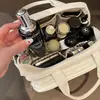 Nova Bolsa de Armazenamento Portátil de Alta Qualidade para Mulheres, Super Popular com Divisórias para Armazenamento de Produtos de Skincare e Bolsa de Maquiagem
