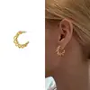 Pendientes de botón huecos retorcidos chapados en oro de 18 quilates, pendientes exagerados en forma de C giratorios para mujer, joyería de moda nicho, venta al por mayor de fábrica