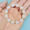 Barraca de ponto cênico vendendo joias feitas à mão com miçangas imitação de jade contas de barril pulseira de vidro atacado masculino e feminino este ano pulseira