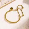 Europa e Estados Unidos novo ins18K ouro aço inoxidável simples moda etiqueta redonda ajustável conta redonda gravação pulseira atacado