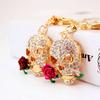 Chaveiro Criativo de Caveira com Rosa e Ceifador Cravejado de Diamantes para Carro Pingente de Bolsa Feminina Acessório de Joia Fivela