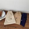 Pantalones Delgados para Niños 2025 Primavera y Otoño Pantalones Casuales para Niños y Niñas Color Puro Versátiles Bordados Pantalones de Algodón para Bebé al Mayoreo