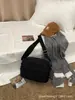 2025 Jierangshi Nuevo Estilo Coreano Color Macarrón Bolsa de Tela de Nylon Moda Hombro Cruzado Versátil Bolso Cuadrado Pequeño