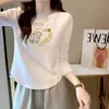 Camiseta de algodón acanalado de manga larga para mujer, nuevo estilo primavera/otoño, corte ajustado, diseño único, dobladillo curvo irregular, top de moda