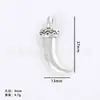 Venta caliente transfronteriza de Amazon aleación DIY accesorios para joyería hueco cabeza de vaca accesorios de cuchillo de luna curvo colgante para collar colgante