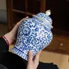 Tarro de té de cáscara de mandarina Xinhui cerámica gran capacidad Especial caja de embalaje caja vacía porcelana azul y blanca tarro general tarro sellado venta al por mayor