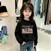 Camiseta básica para niñas, nuevo estilo coreano otoño 2026, camiseta de manga larga con estampado de dibujos animados, top de moda de algodón puro para niños mayores