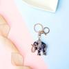 Nuevo llavero de elefante de aleación con incrustaciones de diamantes, bonito accesorio para bolso de mujer, llavero creativo para coche con colgante para pareja