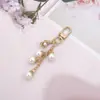 Llavero Colgante de Concha de Perla Nuevo Perla de Imitación Corazón Rosa Melocotón Llavero de Bolsa Colgante Pequeño Exquisito