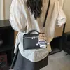 Bolso de Mano Moda Primavera Bolso Tote Pequeño para Mujer 2026 Modelo Nuevo Color Sólido Bolso Cuadrado Pequeño Simple con Patrón de Lichi Bolso de Hombro Cruzado Único