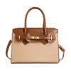 Bolso de mano de moda transfronterizo tipo Kelly para mujer, nuevo estilo verano 2026, bolso de nicho para el día a día, bolso de hombro y cruzado