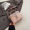 Bolso cuadrado pequeño de textura casual 2025 primavera nueva tendencia estilo occidental diseño nicho moda dama bolso de hombro mensajero